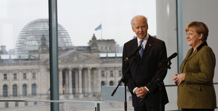 German Chancellor Merkel and U.S. Vice President Biden address the media before talks in Berlin
